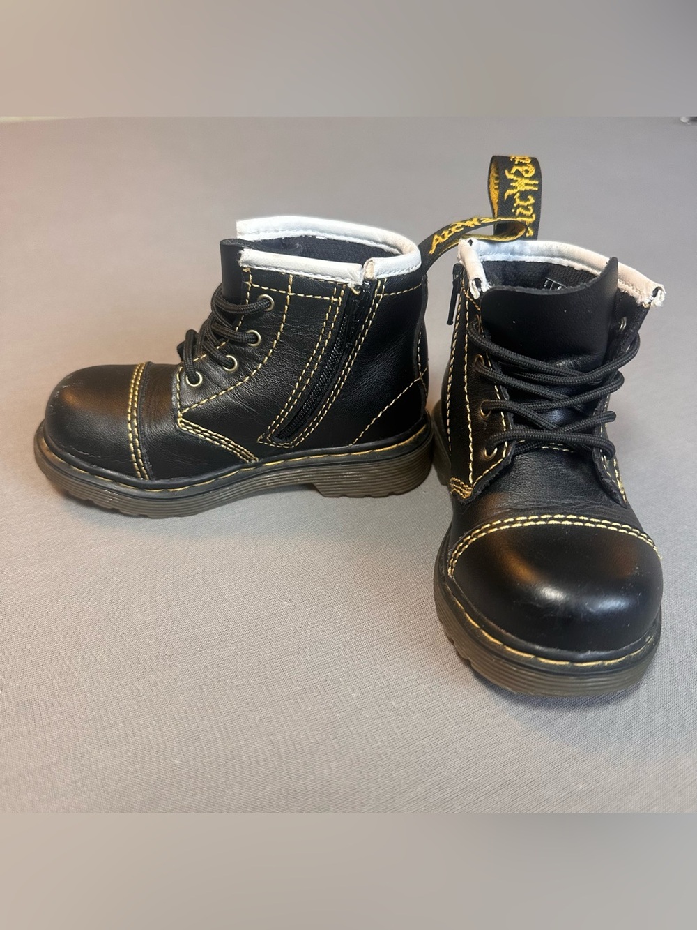 Dr.‎ Martens Kids Black Ankle Boots with Yellow Stitching